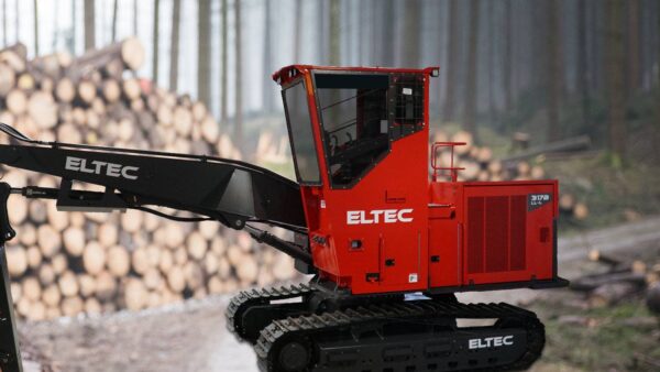 ELTEC LL317B log loader in a snowy forest